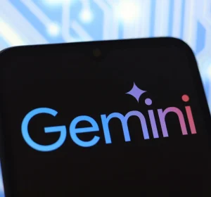 Google Gemini AI logo displayed on a smartphone screen against a blue circuit board background