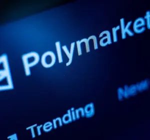 Polymarket name and logo displayed on a dark blue digital screen